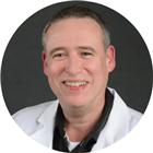 Dr. John Grieveson, MD