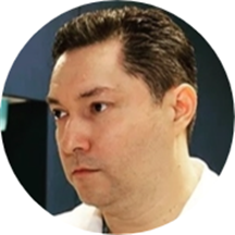 Dr. Magnon Reyes, DDS