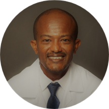 Dr. Micheas Zemedkun, MD