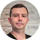 Dr. Oleksii Negreskul, DDS